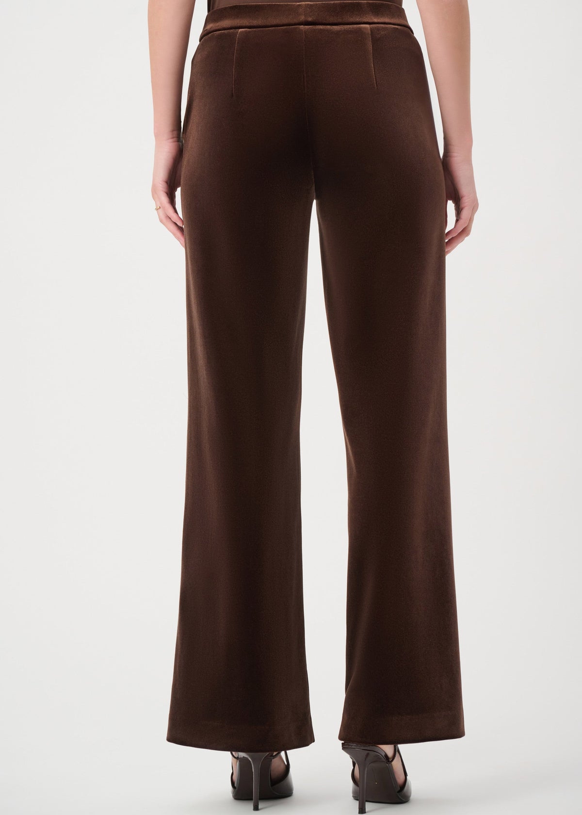 Brown wide-leg pants worn by a person on a white background