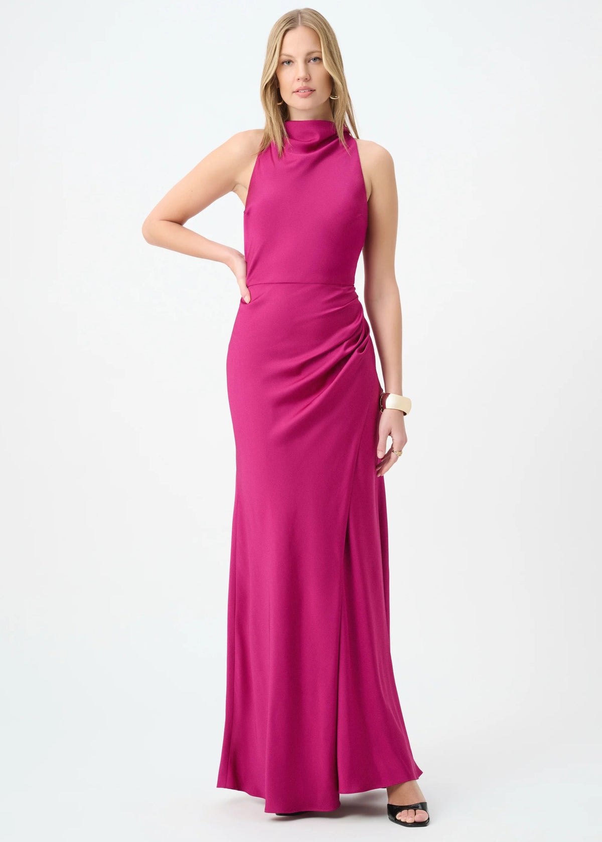Woman wearing a pink evening gown on a white background