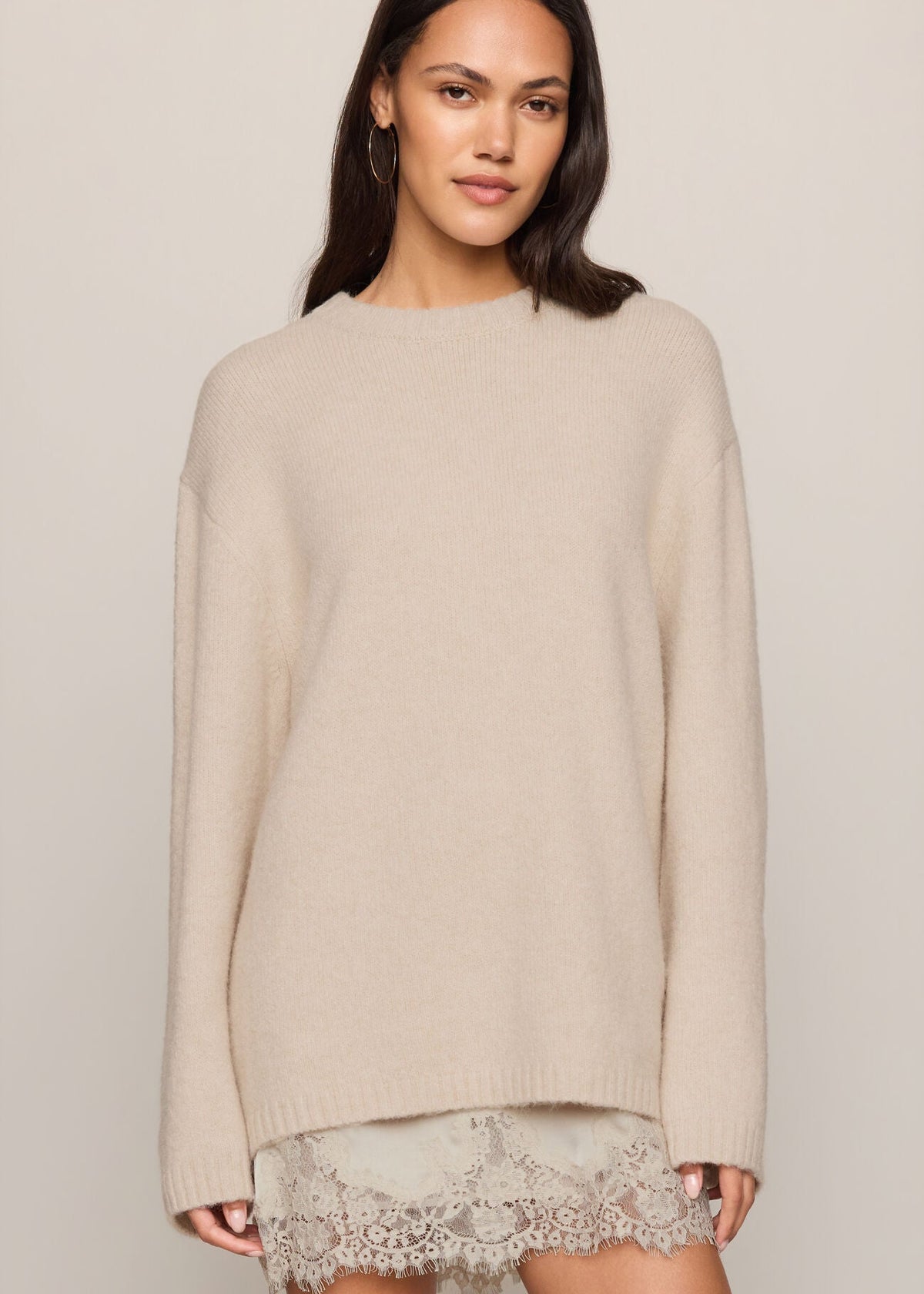 woman in beige sweater