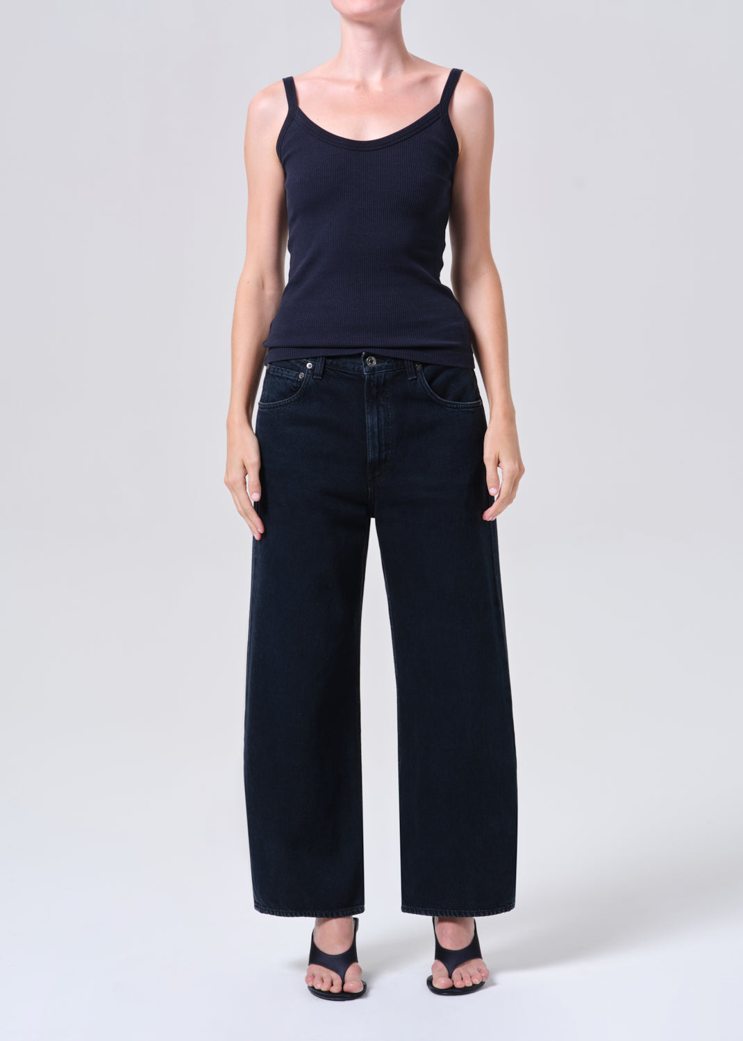 Woman in dark jeans