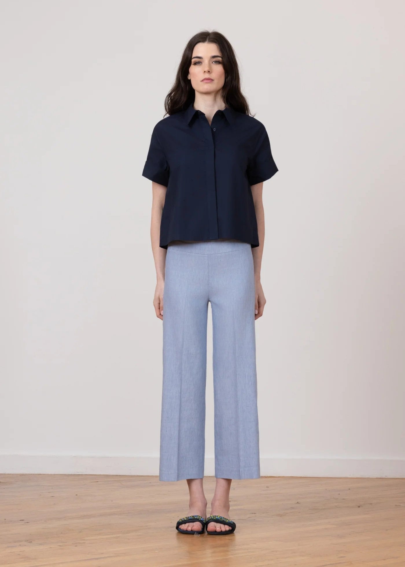 Woman in blue linen pants