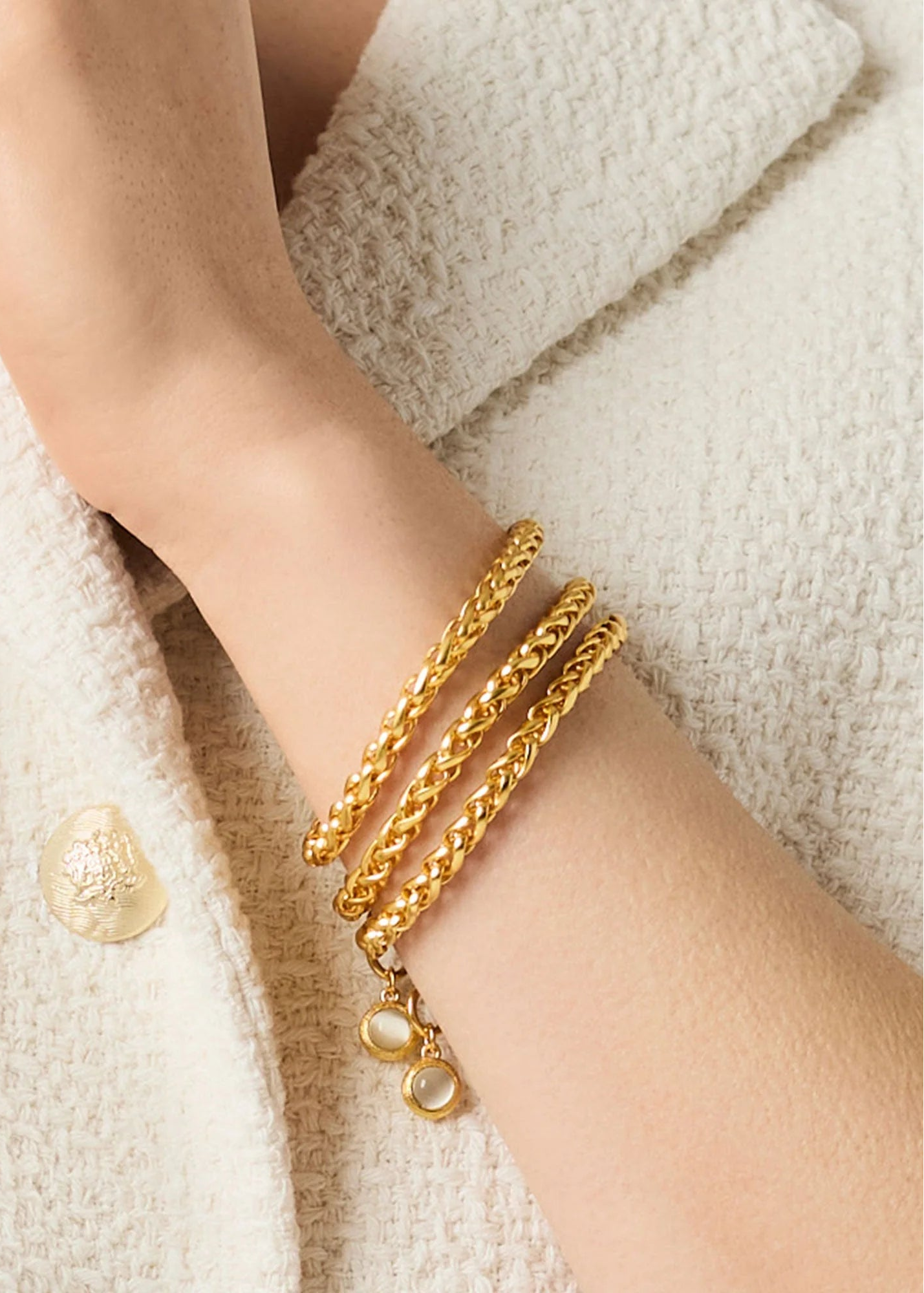 woman wearing gold plated bracelet