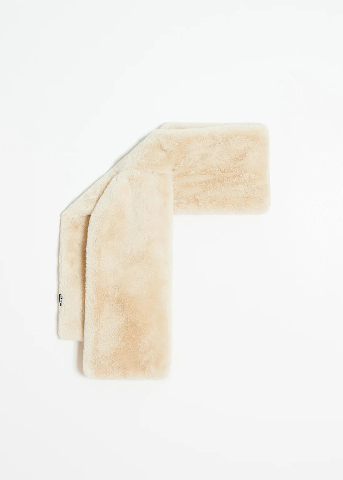 A folded beige faux fur blanket or throw on a solid white background.