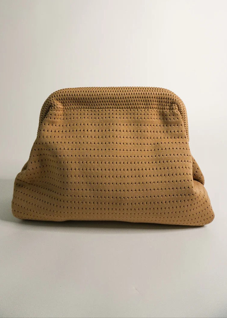 Brown textured bag on a light gray background