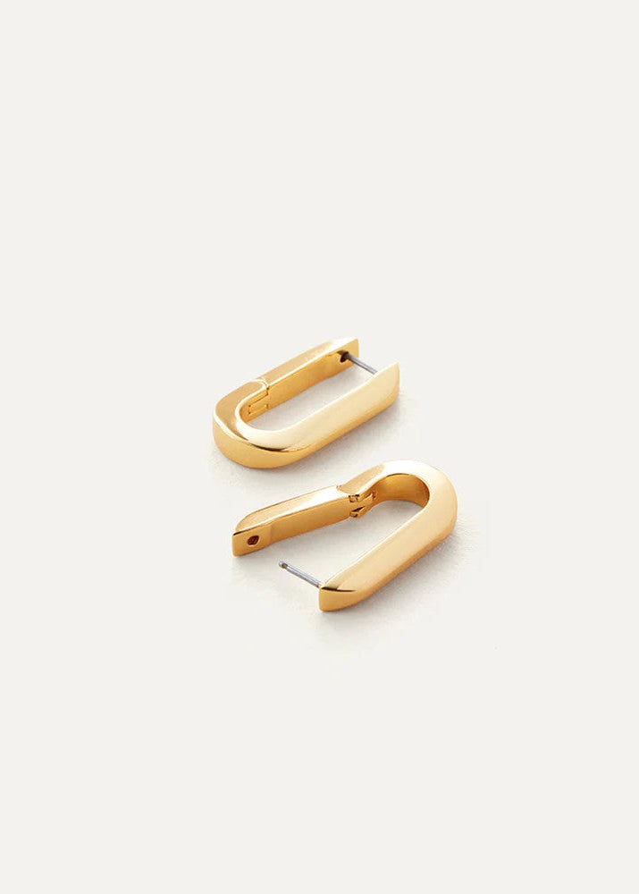 Gold hoop earrings on a white background