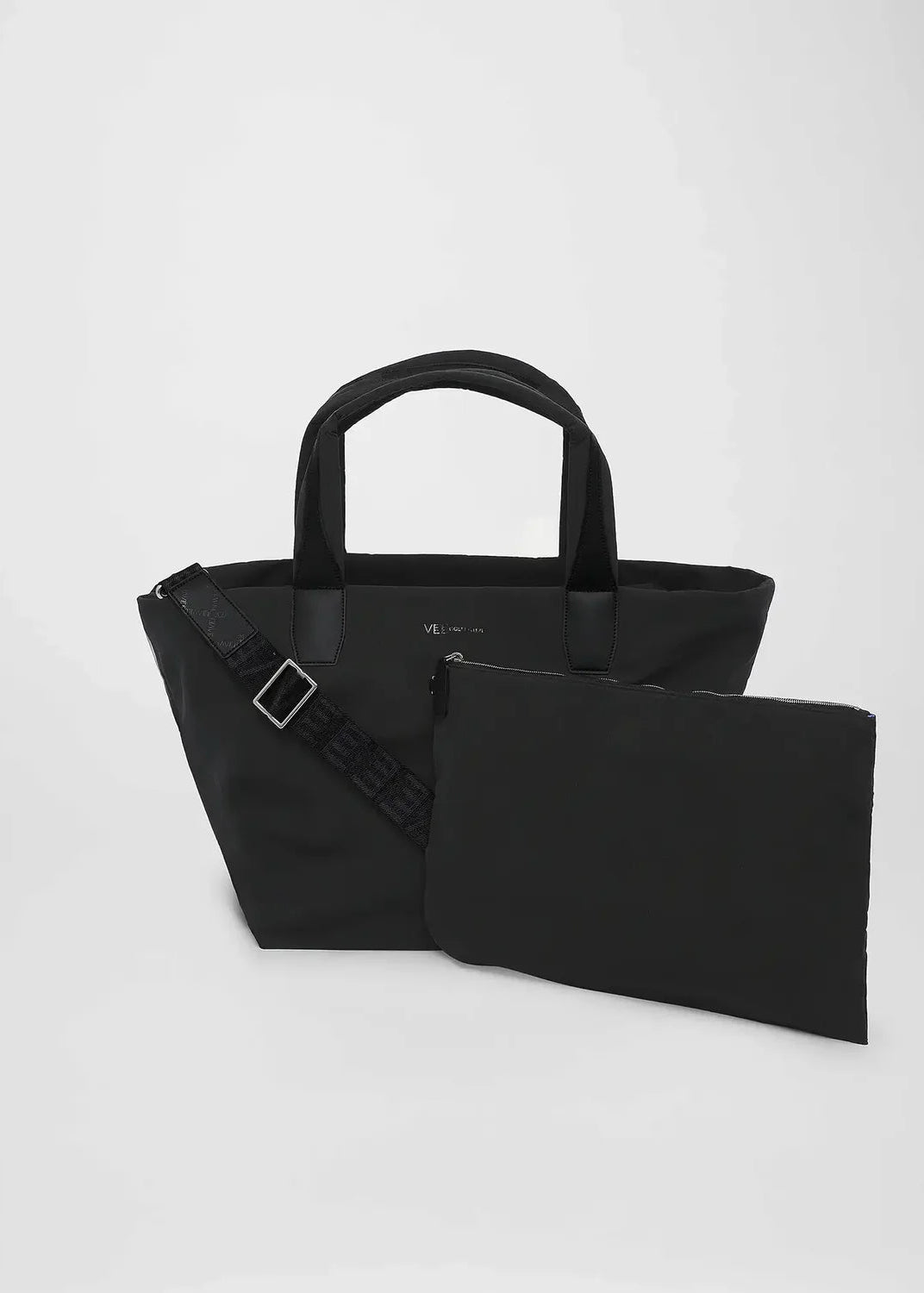 Black handbag with pearl handle on a white background