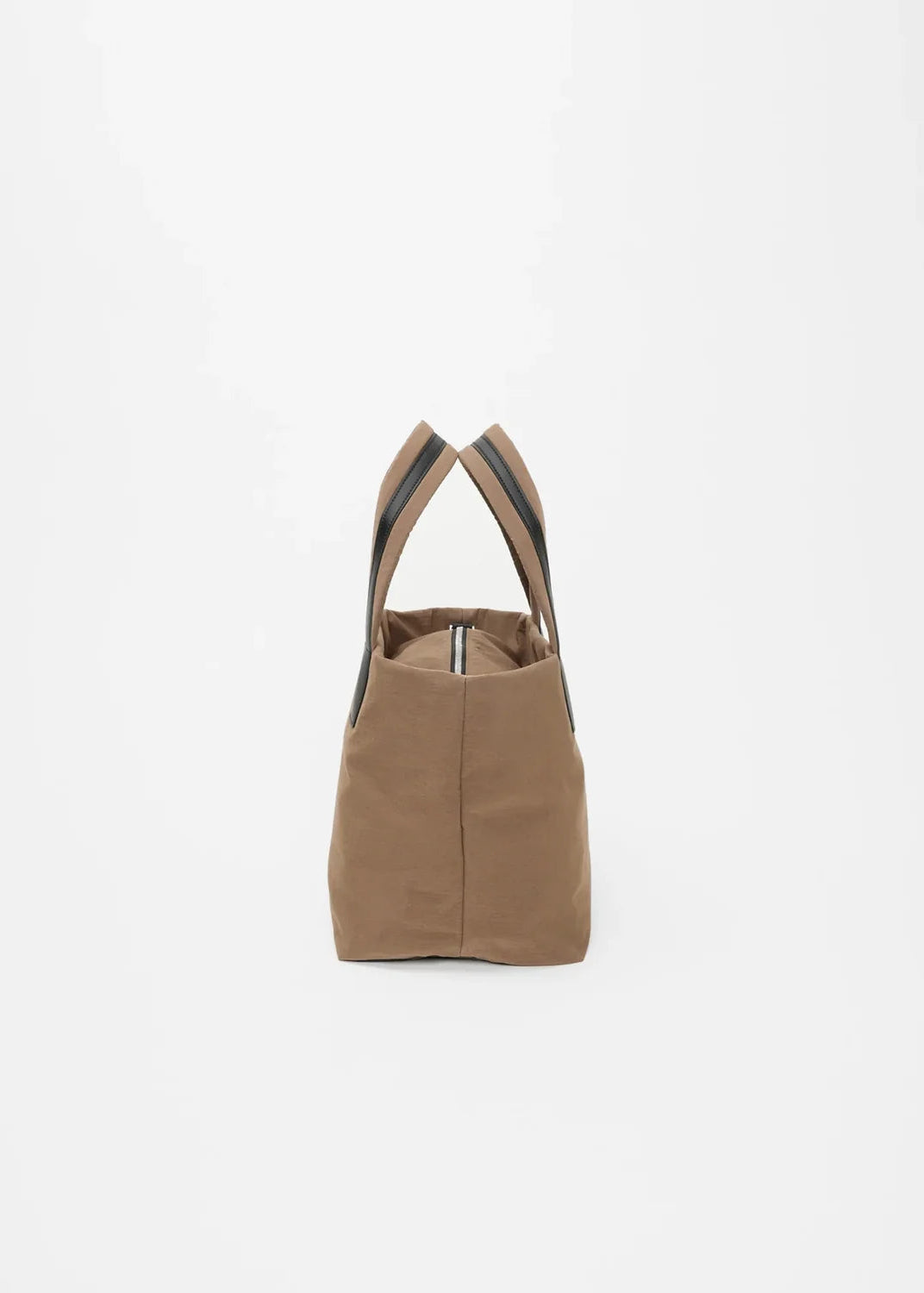 Brown tote bag with black straps on a white background