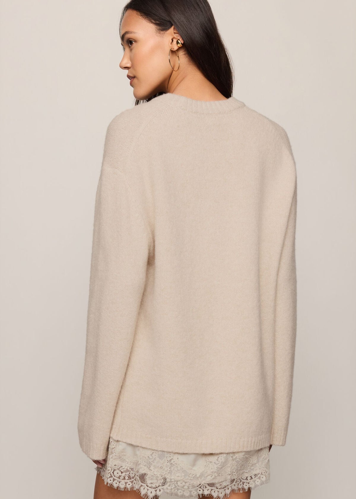 woman in beige sweater