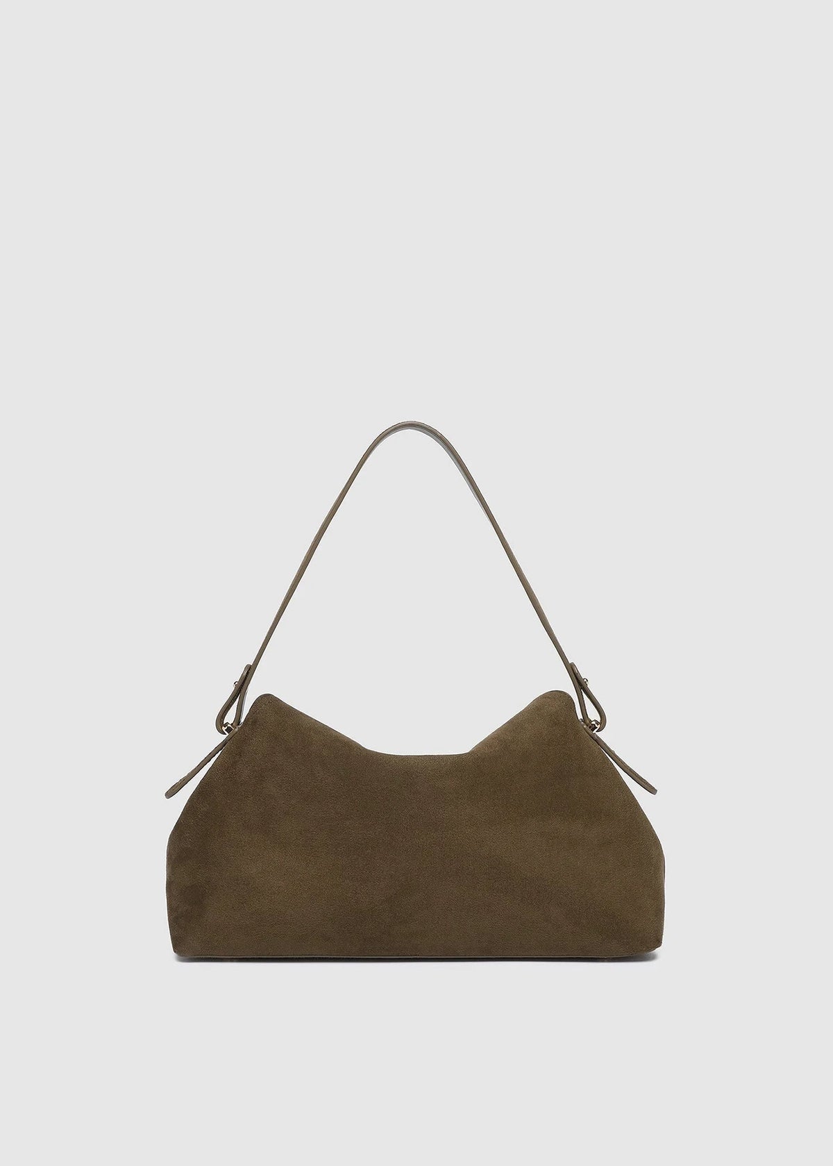 A dark brown suede shoulder bag with a curved, slouchy silhouette and a single thin strap, shown against a light gray background.