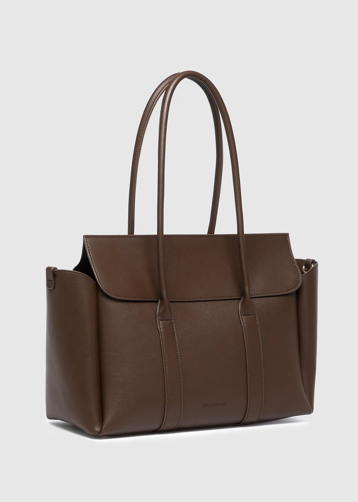 Brown leather tote bag on a light gray background