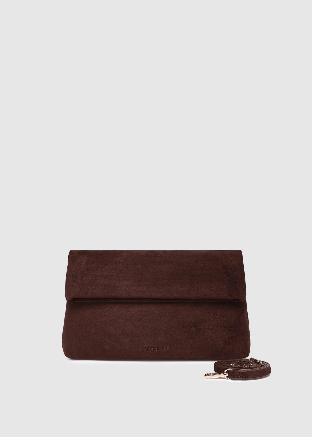 Brown suede clutch bag with a strap on a light gray background