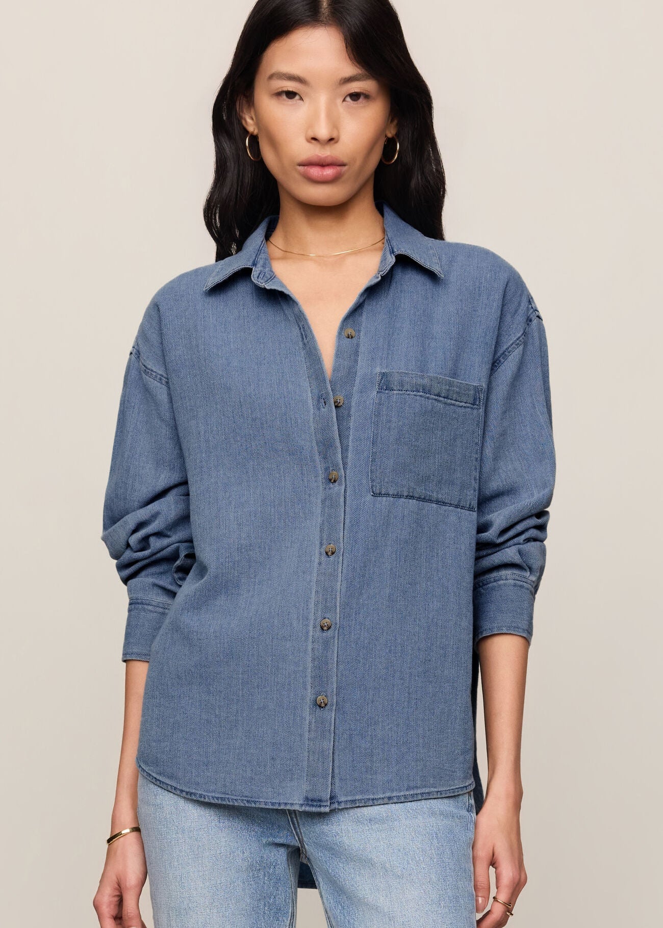 Wmoan in blue shirt