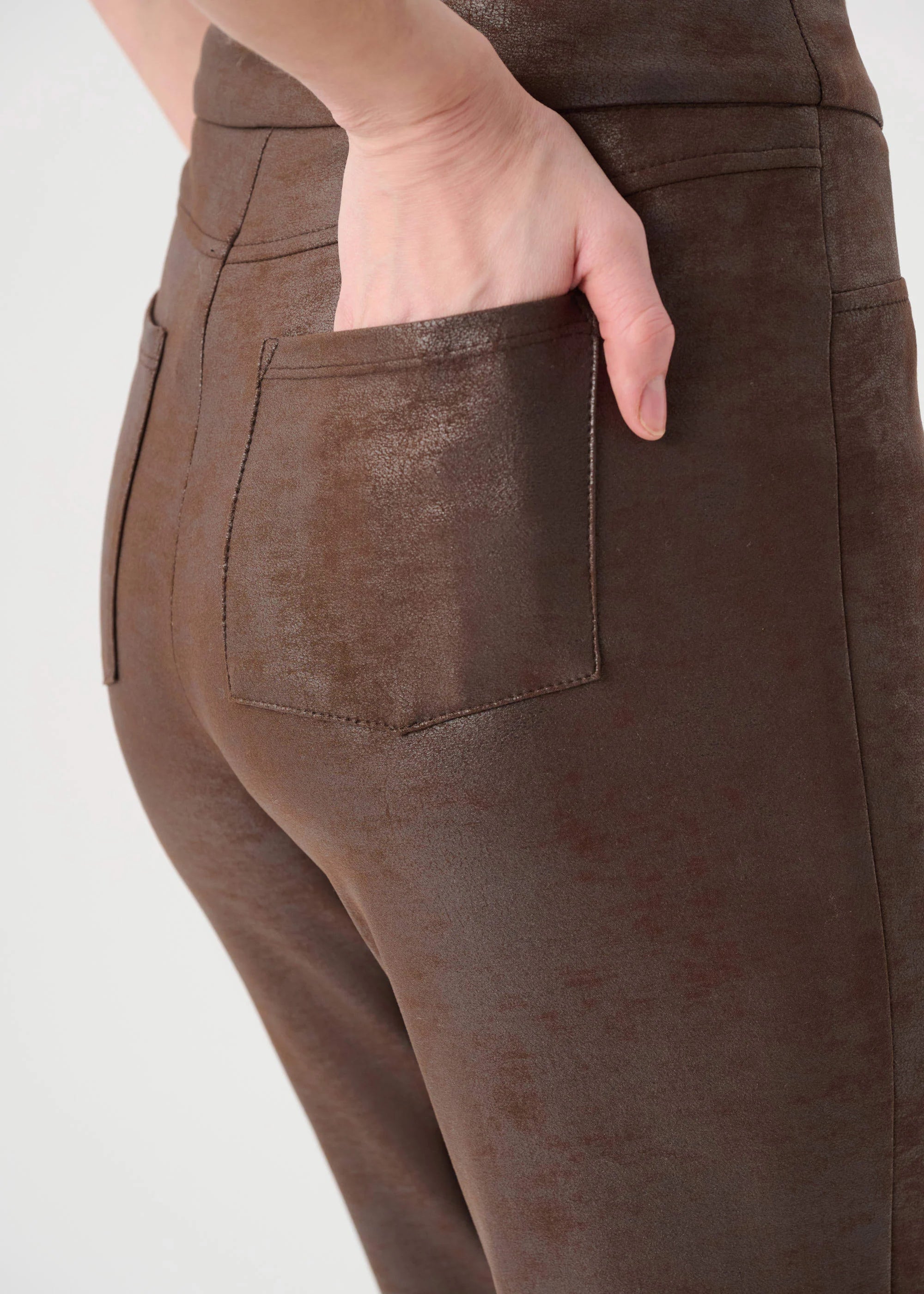 Brown pants with a pocket on a white background