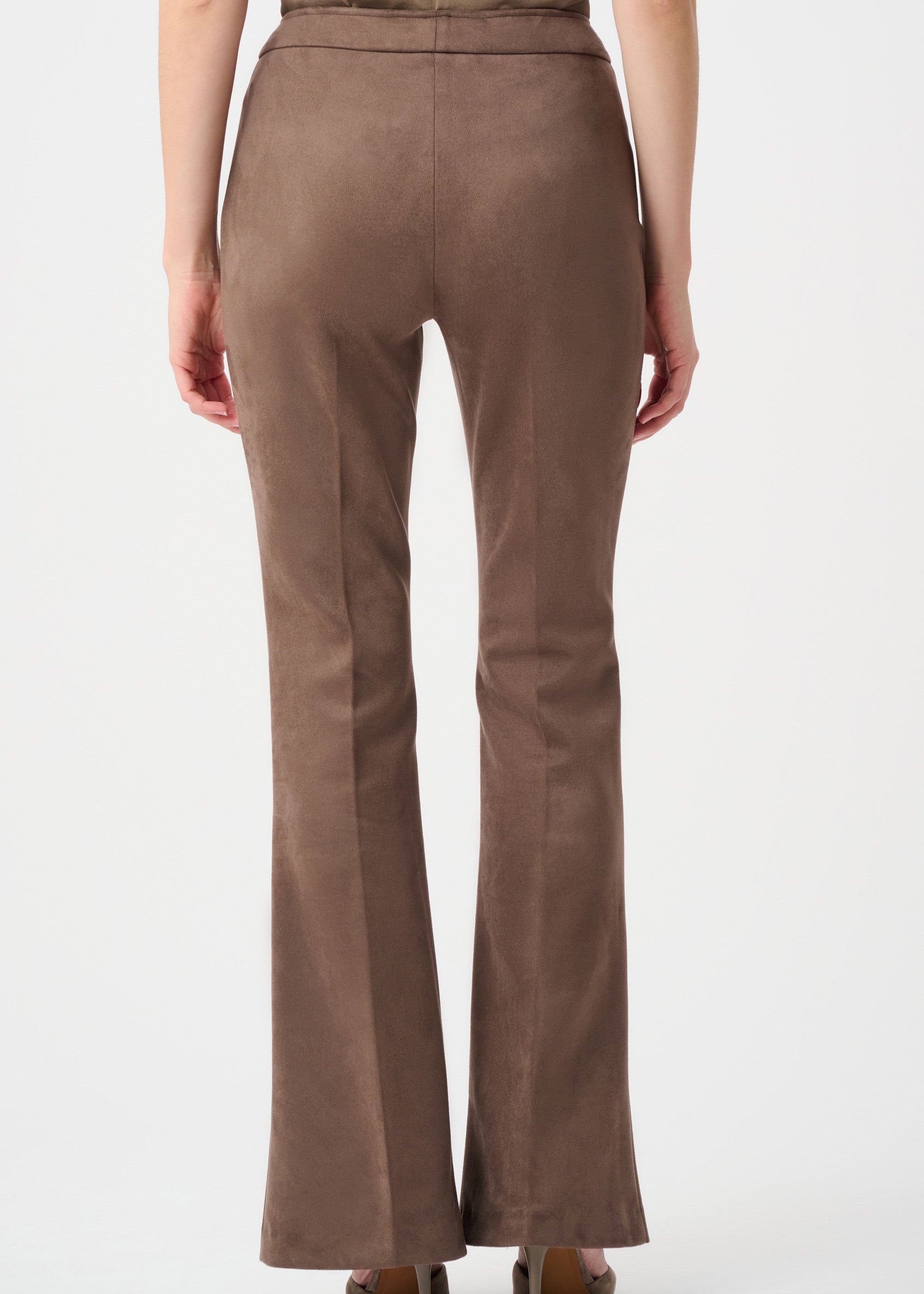 Brown flared pants on a white background