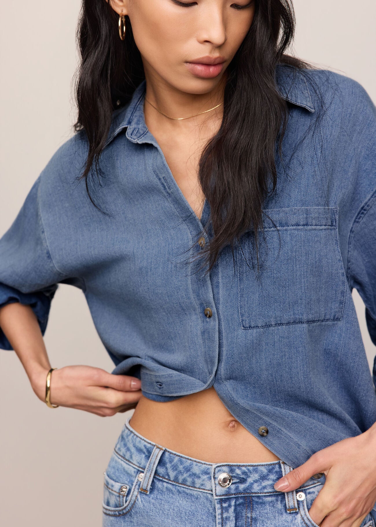 Wmoan in blue shirt