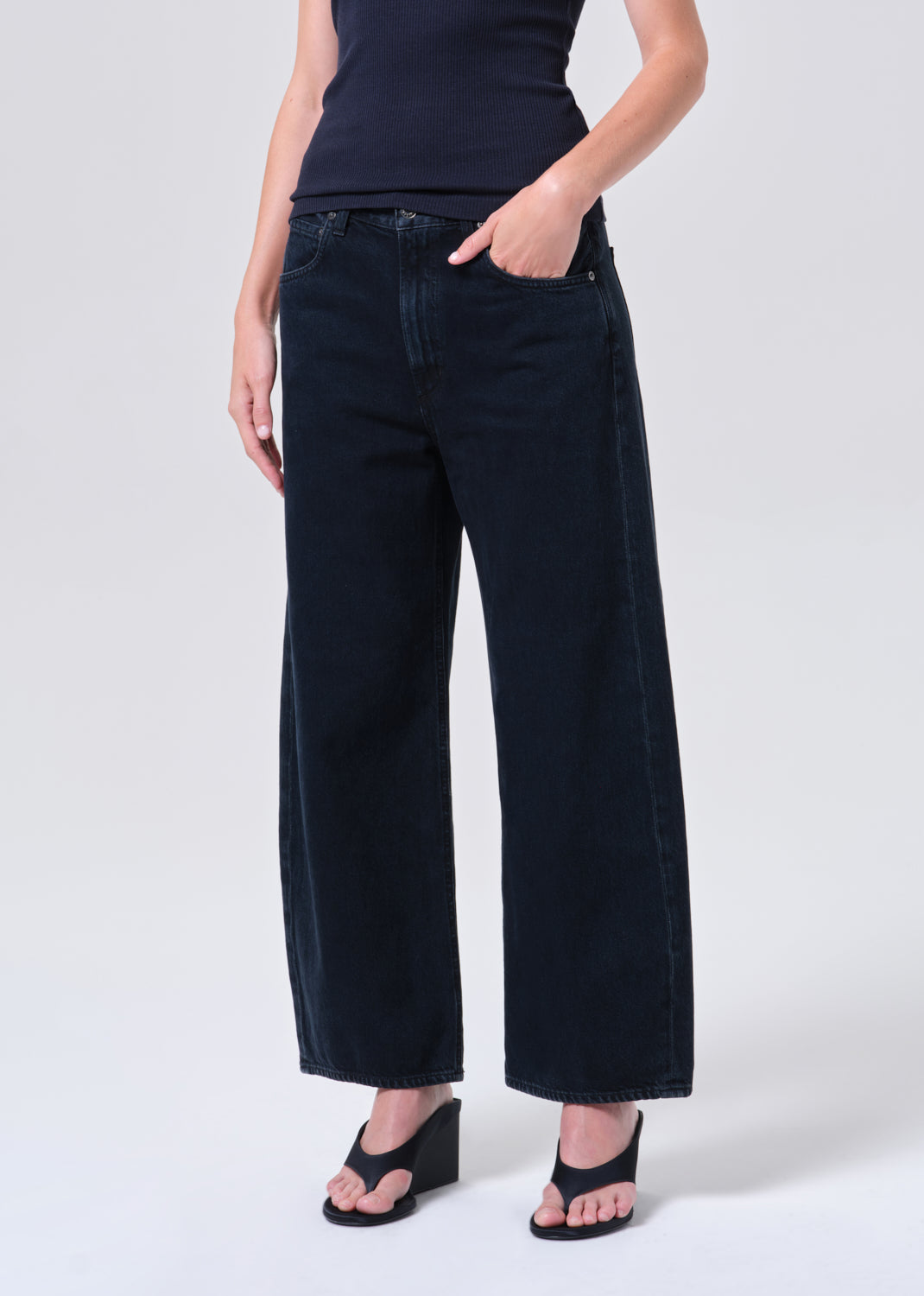 Woman in dark jeans