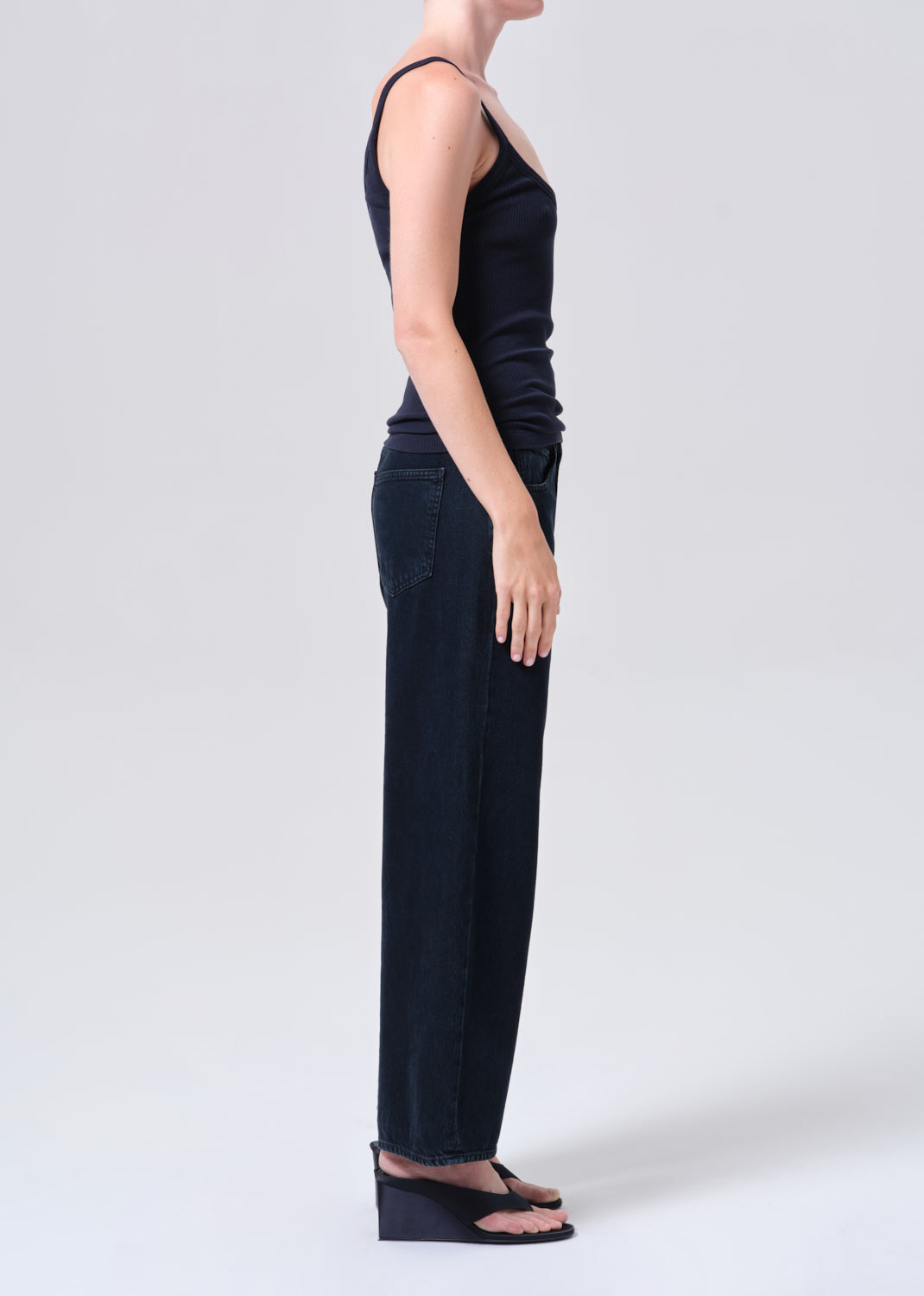 Woman in dark jeans