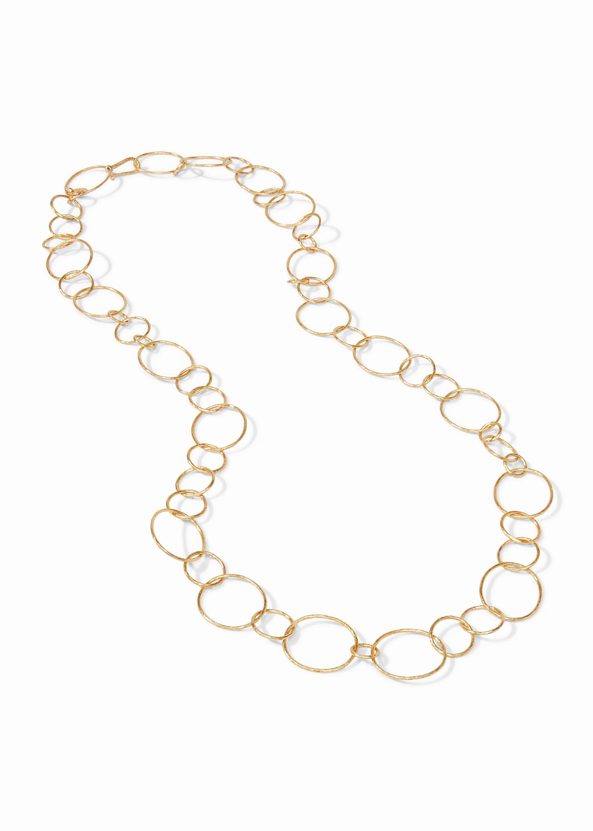 Gold chain necklace on a white background