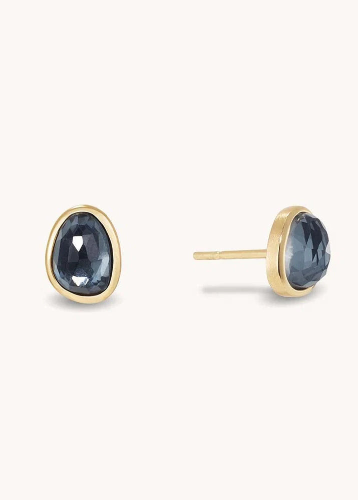 Rectangular blue gemstone on a white background