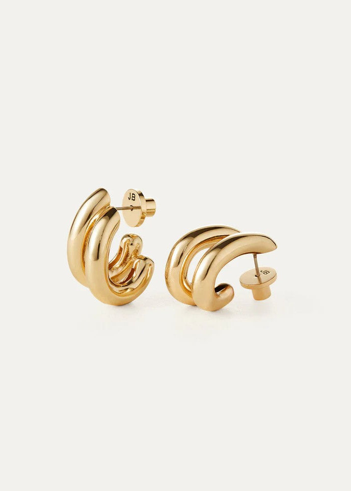 A pair of gold-toned triple-band hoop earrings shown from two angles on a light off-white background.