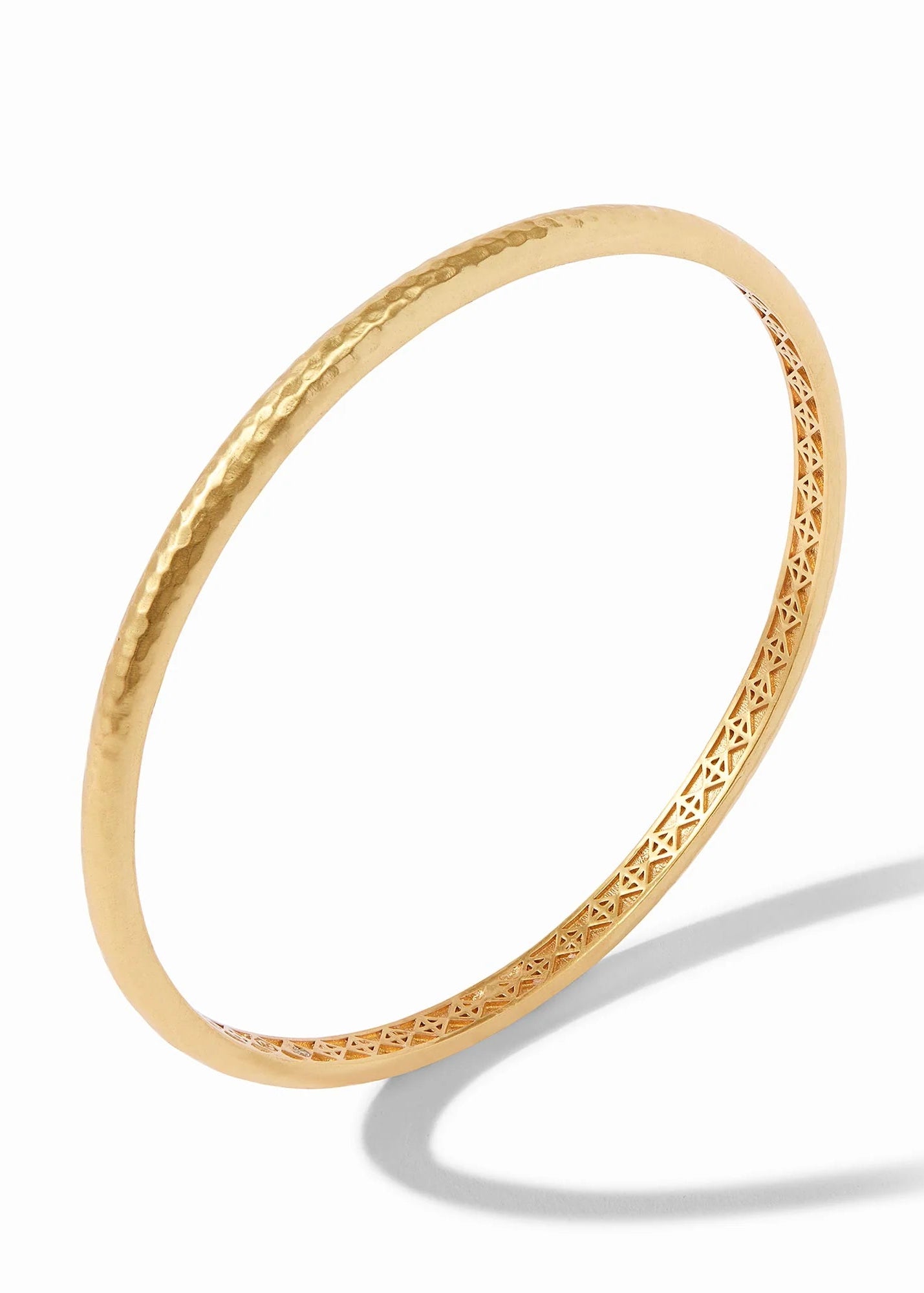 Gold bracelet on a white background