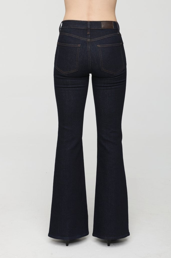 Black flared jeans on a white background