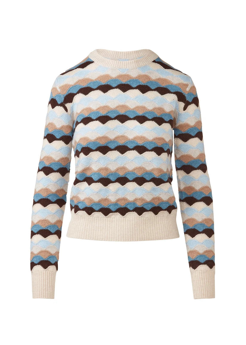 A long-sleeve knit sweater with horizontal wavy stripes in cream, light blue, tan, and dark brown, featuring ribbed collar, cuffs, and hem.