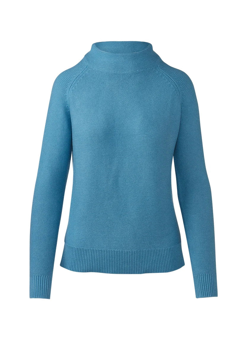 A light blue ribbed knit mock neck sweater with raglan sleeves, shown against a plain white background.