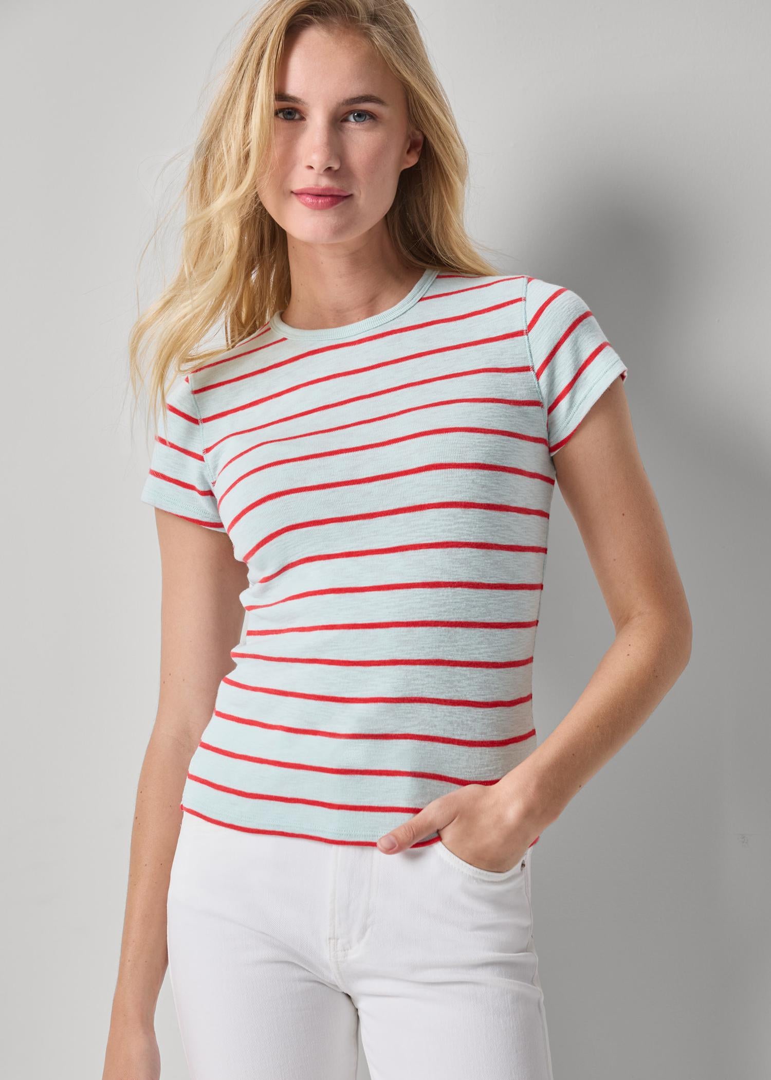 woman wearing stripped shirt on grey backgound