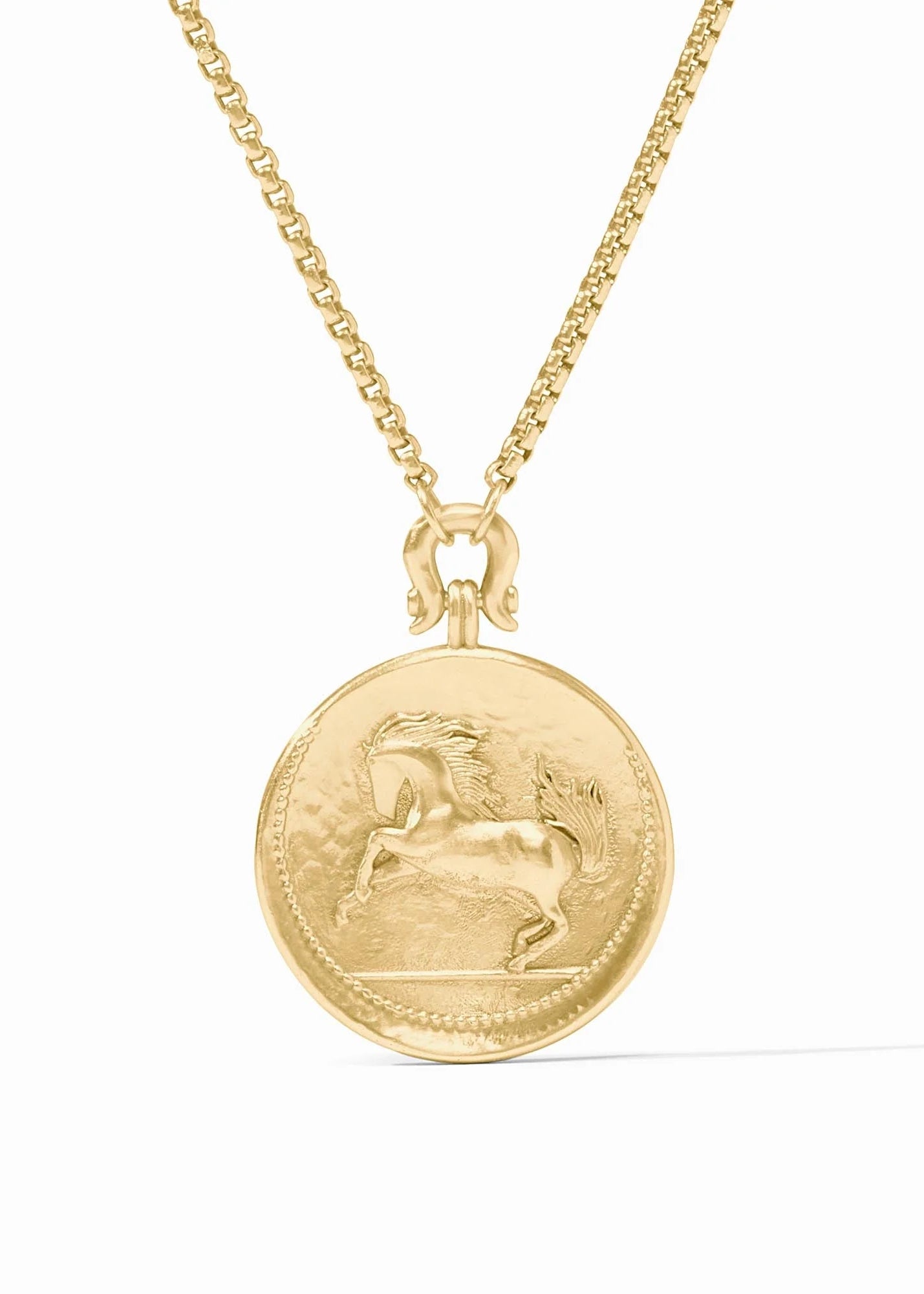 Gold necklace with a horse pendant on a white background