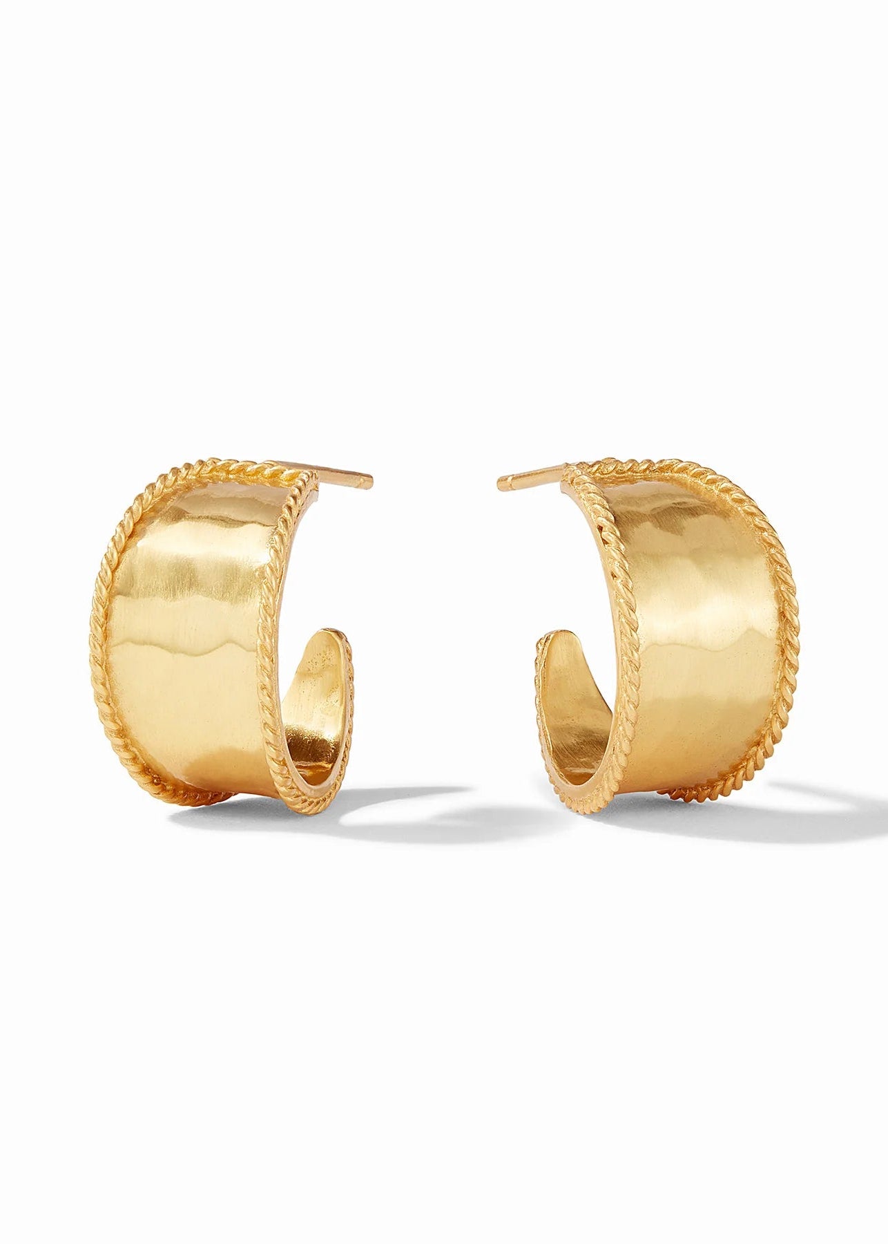 A pair of chunky gold hoop earrings with a textured hammered finish and a twisted rope edge, displayed on a clean white background.