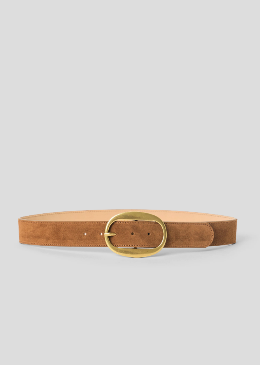 A tan suede belt with a polished gold oval buckle, displayed on a neutral light gray background.
