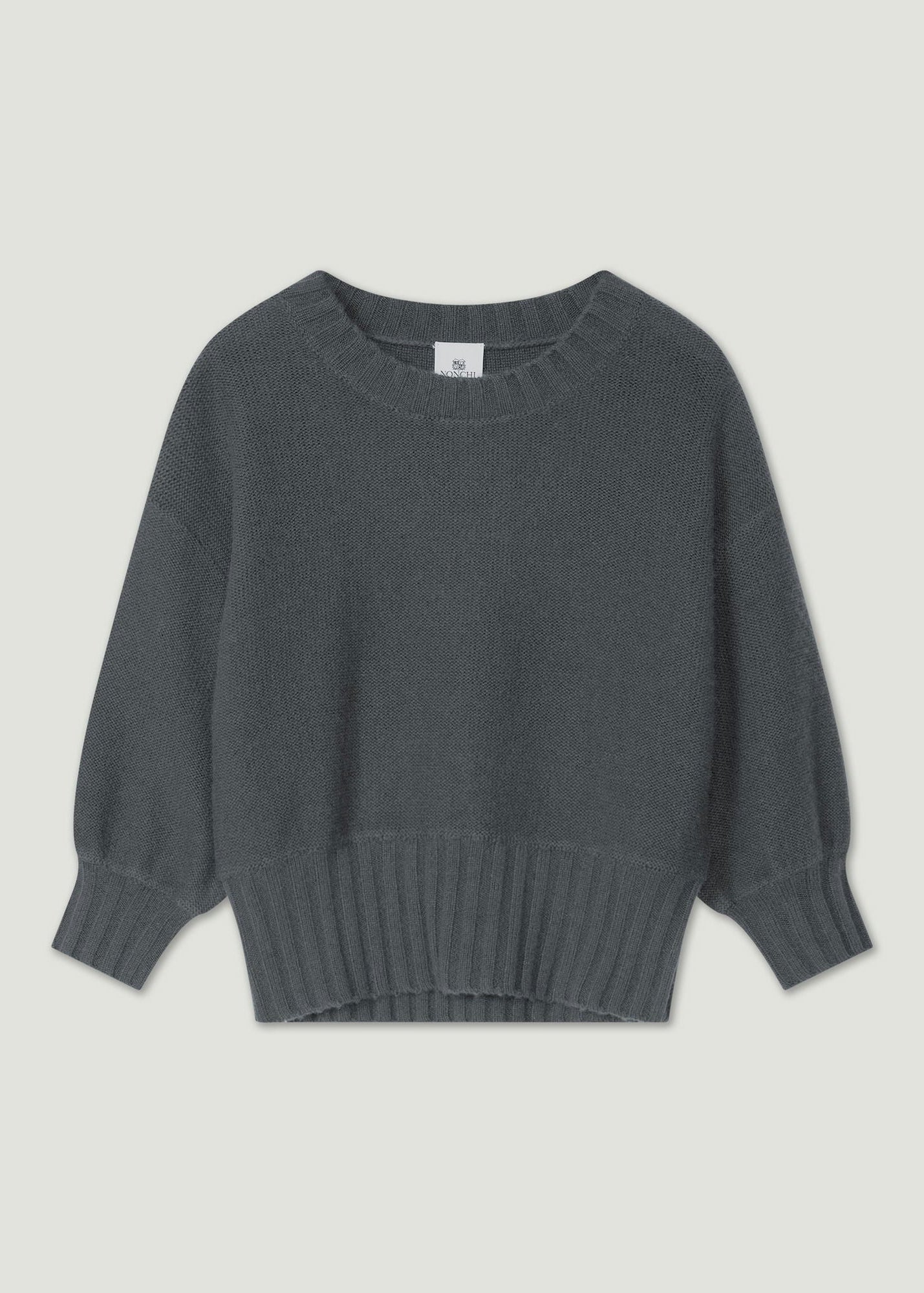 A dark gray knit sweater with long balloon sleeves and a ribbed hem, displayed flat against a light gray background.