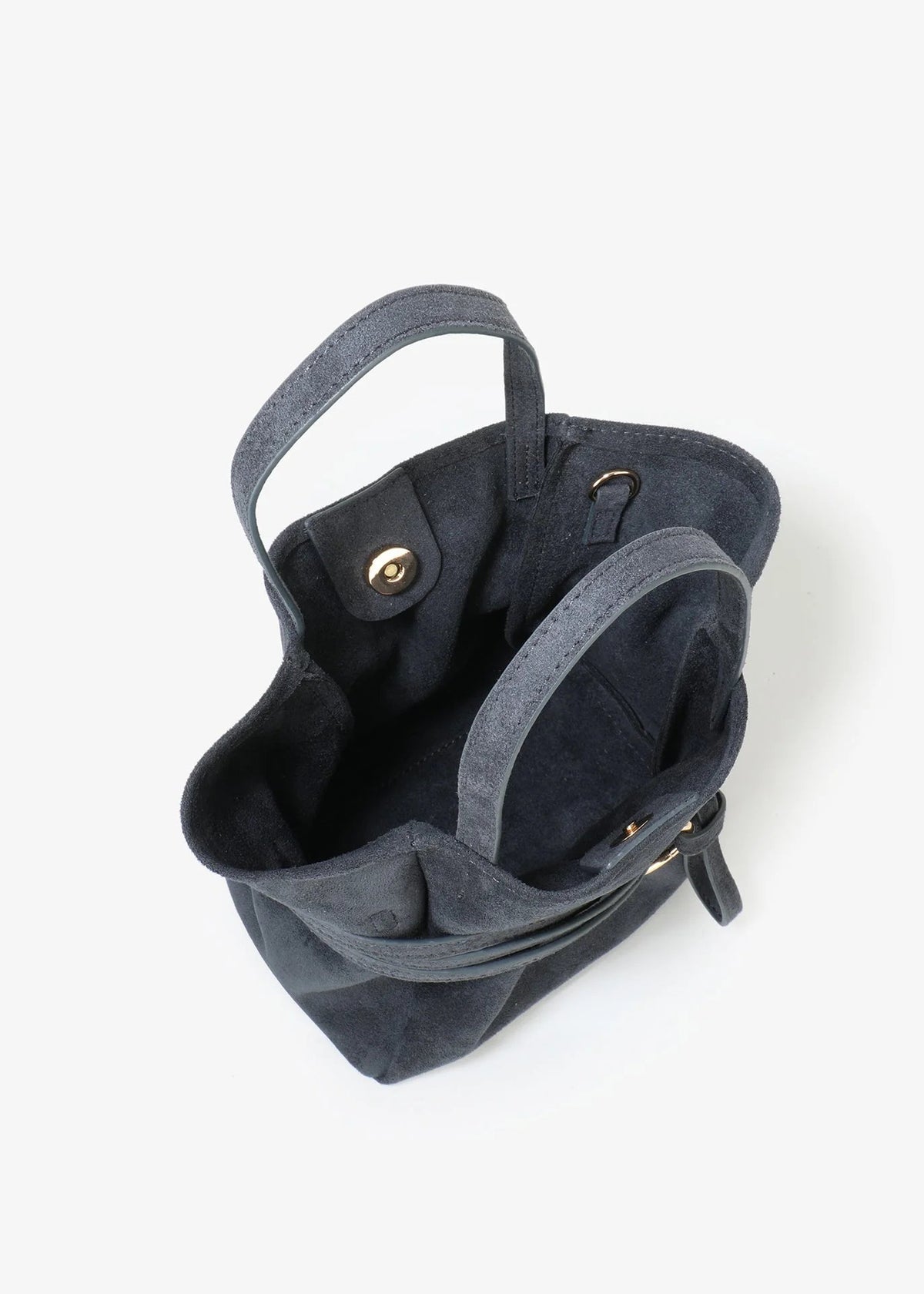 Dark gray handbag with gold hardware on a white background