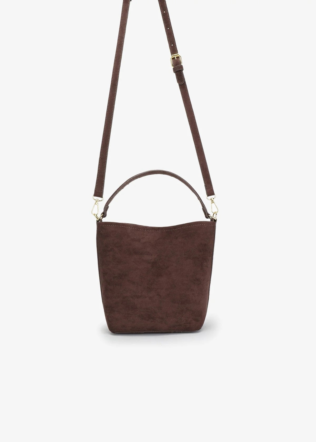 Brown suede handbag with a strap on a light gray background