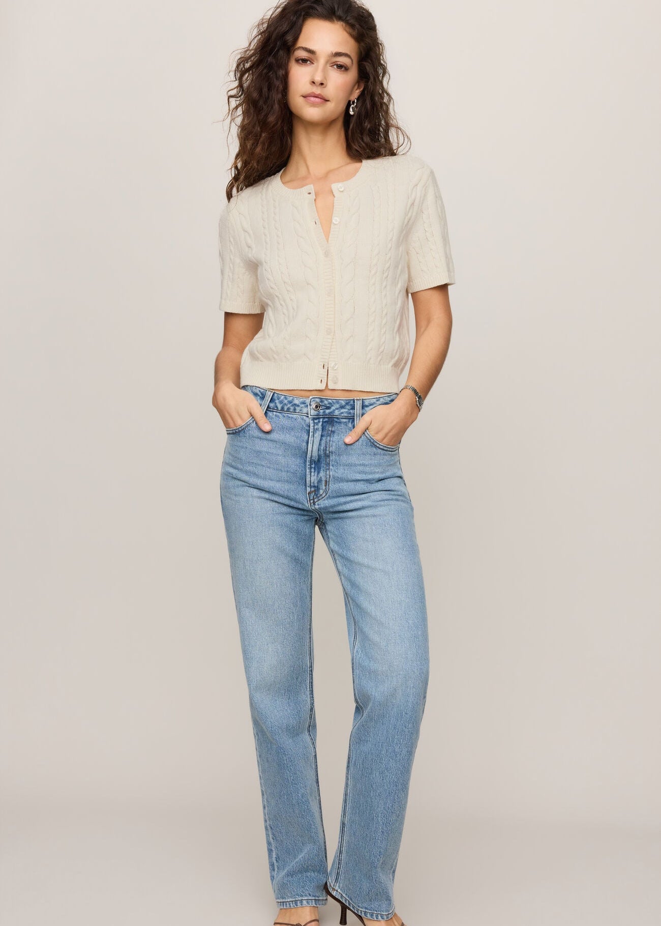 Woman in white short sleeve shirt