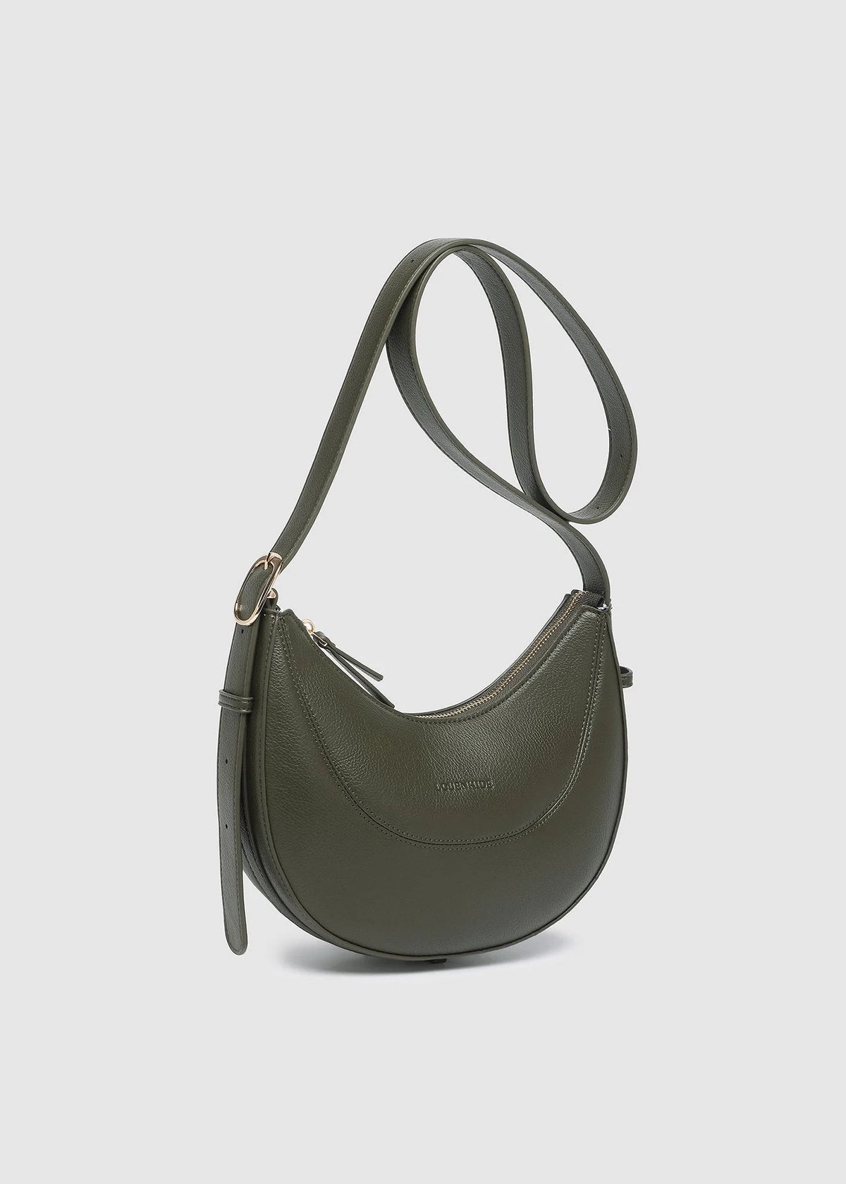 Green shoulder bag on a light gray background