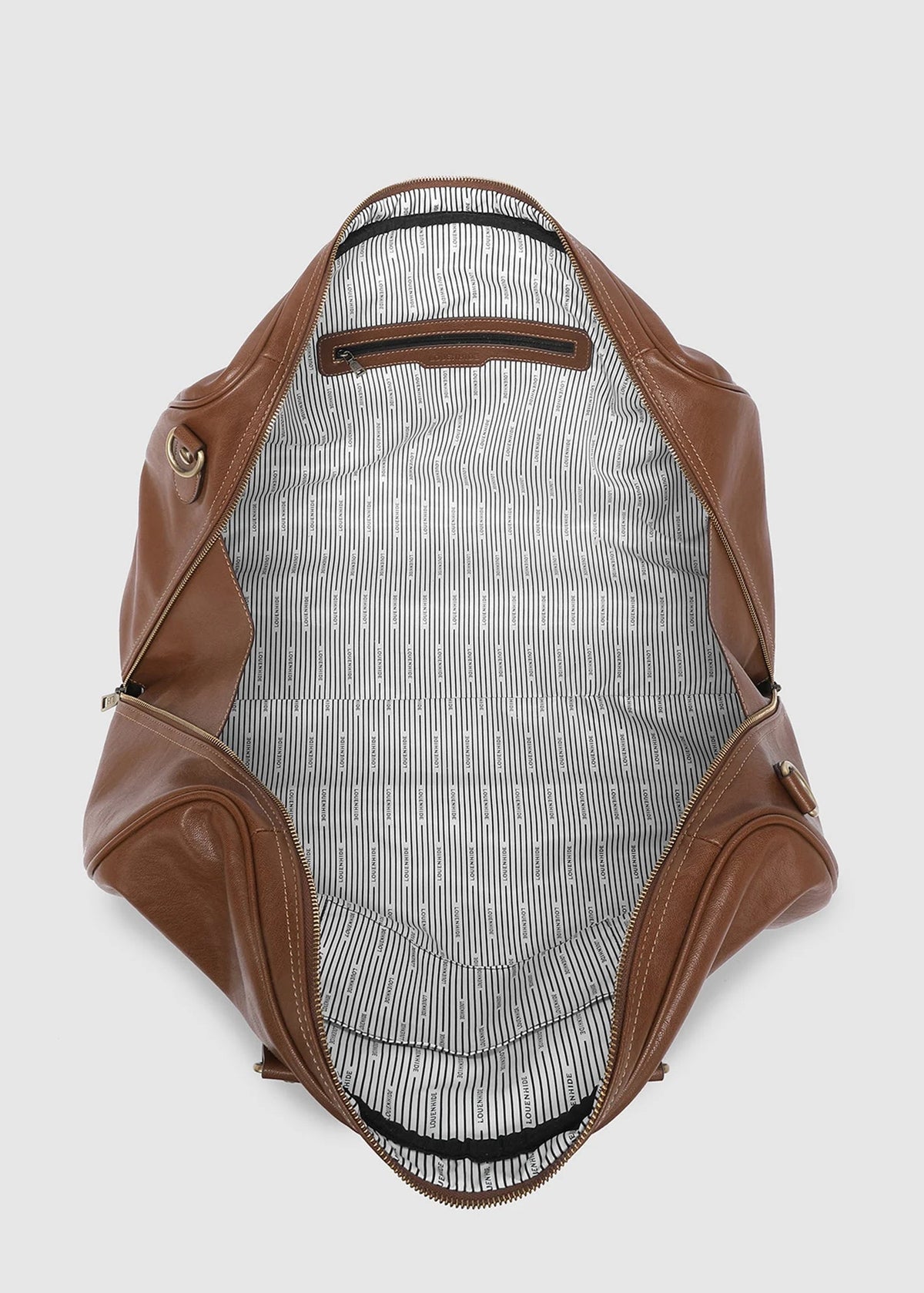 Brown leather bag with a textured interior on a light gray background