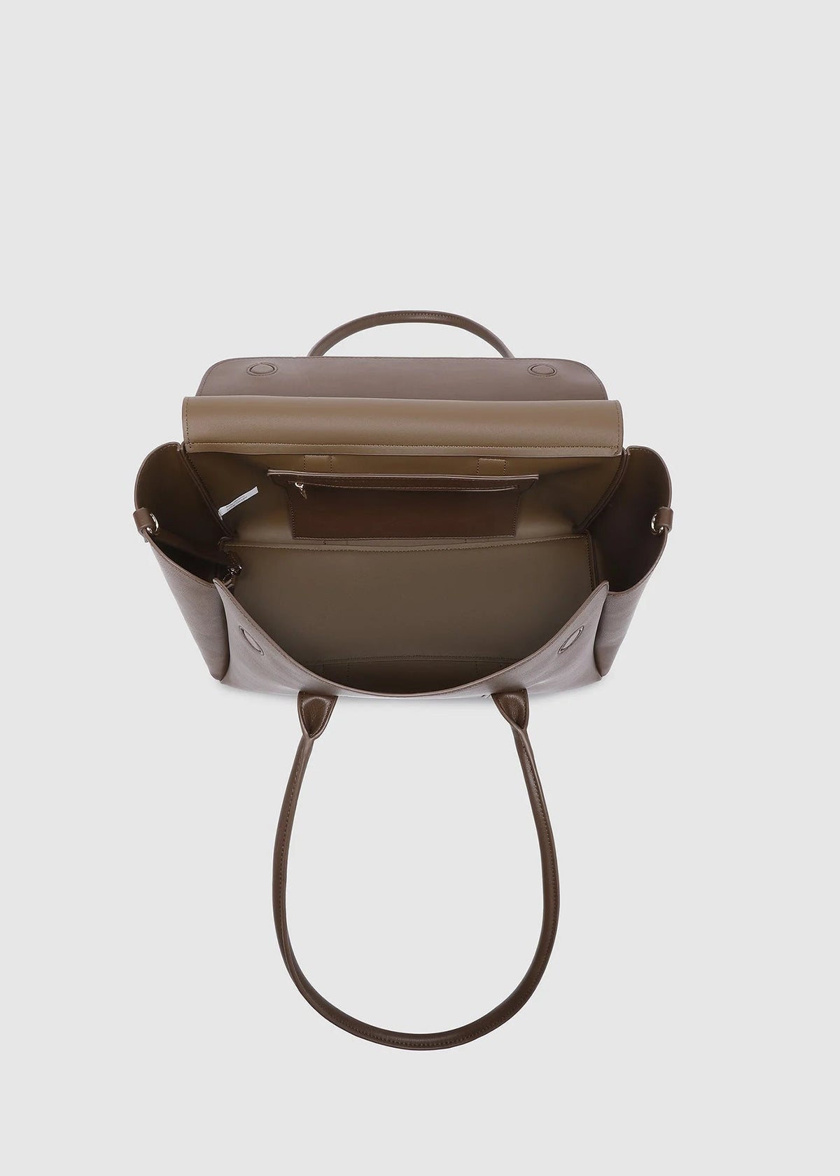Brown handbag with a shoulder strap on a light gray background