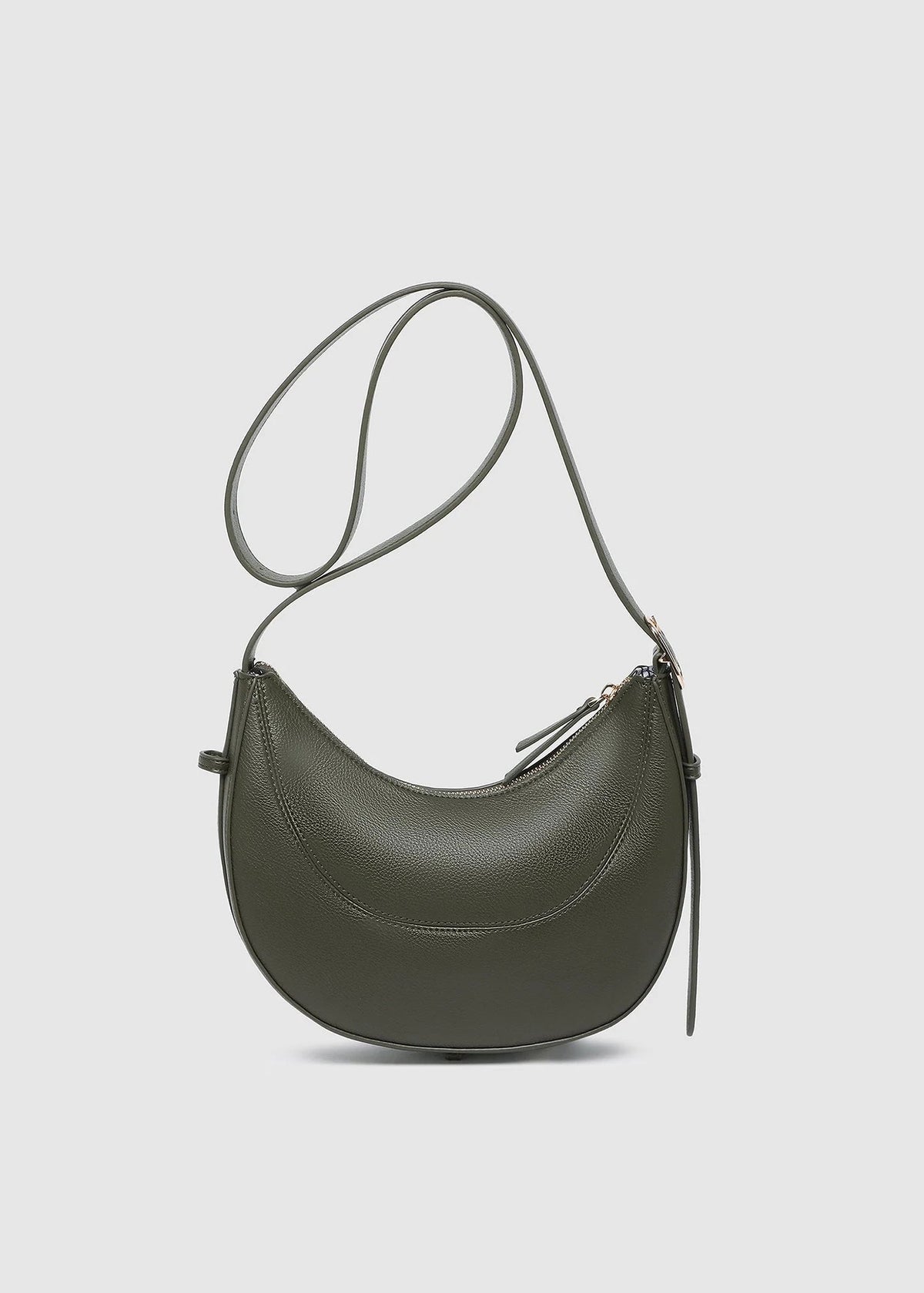 Green handbag on a light gray background